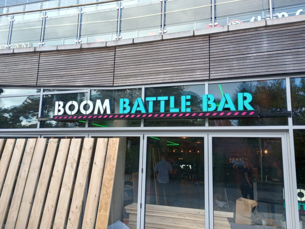 Signage in Bournemouth for Boom Battle Bar, 2022